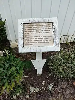 Image of a plaque describing the history of the church on the site.