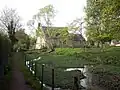 Disused watercress bed, dating from the 1950s,[13] and parish church