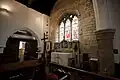 The sanctuary end with altar and antependium.