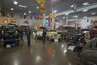 Group of cars in a large garage