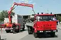 Same crane, extended to recover a damaged car.