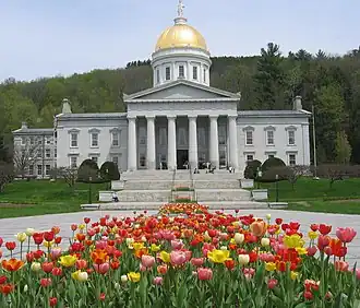 Image 3The gold leaf dome of the Vermont State House in Montpelier is visible for many miles around the city. This is the third State House on the site, and like the second, was built in the Greek Revival architectural style. It was completed in 1857. Montpelier became the state capital in 1805. (from History of Vermont)