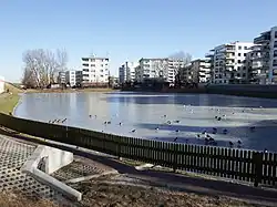 Apartment buildings around the Jeziorzec Pond in Górce, in 2015.