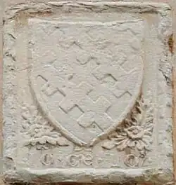 Ancient stone coat of arms located between the first-floor windows of Casa Trissino, Corso Italia 35, Valdagno (13th century).