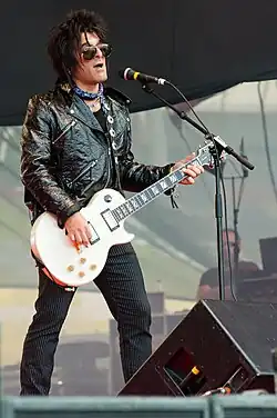 Conte performing at the 2011 Ilosaarirock festival with Michael Monroe band