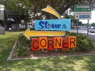 Stones Corner sign, corner Logan Road and Montague Road, 2015