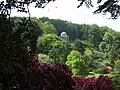 The Temple of Apollo high on a hill overlooking the gardens, based on a circular temple at Baalbec