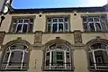 Façade on the Rue de Phalsbourg (detail): lower part built in 1903, upper part added in 1904
