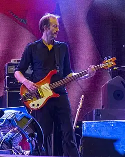 Osman performing with Suede at Lokerse Feesten in Lokeren, Belgium in 2012