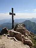 Summit cross on Großer Rettenstein. Behind: Kleiner Rettenstein.