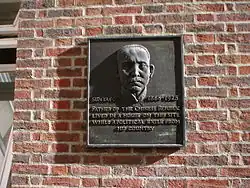 The plaque shows the head of Sun Yat-sen.