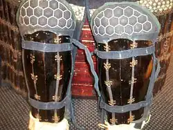 Japanese greaves, or suneate. The knee area has hexagonal iron plates called kikko sewn inside the cloth.