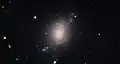 ESO 486-21 is a spiral galaxy with a somewhat irregular and ill-defined structure.[21]
