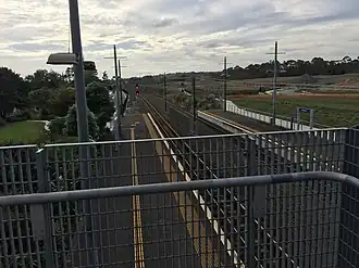 The platforms as well as tracks leading into the station. Photo faces east.