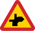 (thick is priority road) Road intersection where drivers of vehicles on connecting roads have a duty to give way.