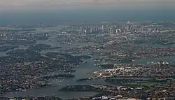 Aerial view across the mouth of the river as it reaches in Port Jackson