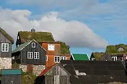 Image 19Traditional Faroese houses with turf roof in Reyni, Tórshavn. Most people build larger houses now and with other types of roofs, but the turf roof is still popular in some places. (from Culture of the Faroe Islands)