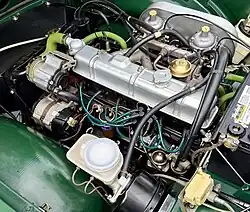 Engine with full 1976 US emissions control including smog pump, charcoal canister, EGR valve, EGR mileage counter, etc., from the final week of TR6 production, July 1976
