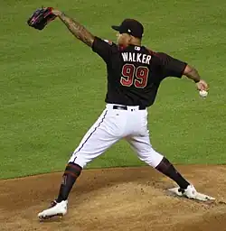 Taijuan Walker, from behind, throwing a pitch