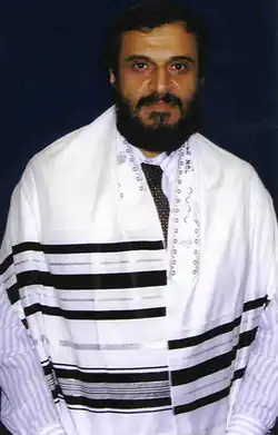 A rayon tallit with black stripes