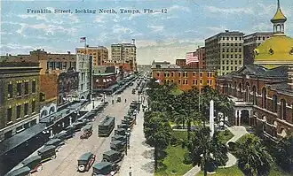 A view north along Franklin Street in 1922. The old Hillsborough County Courthouse is pictured on the right. A Confederate Monument is located in front of the courthouse, on the lower right.