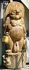 A wooden tanuki sculpture in Unzen.