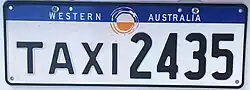 Black on White Taxi plate