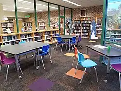Young Adult books lining the shelves inside the Teen Lounge