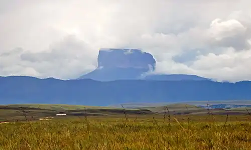 A compact tepui among clouds