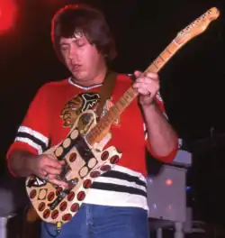 Kath wearing a Chicago Blackhawks hockey jersey in 1975.