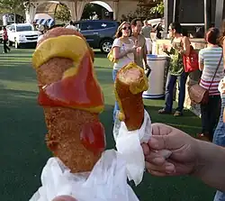 "Corny dogs" being eaten at the State Fair of Texas