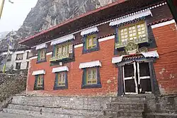 Exterior of a colorful red-brick building