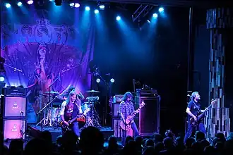 The Sword in 2013; left to right: Kyle Shutt, Jimmy Vela (back), John D. Cronise, Bryan Richie