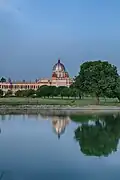 The palace and its reflection on the water body inside the compound