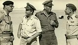Israeli generals Haim Laskov, Moshe Kashti&nbsp;[he], Asaf Simhoni, and Tolkowsky in the Sinai Peninsula, 1956.