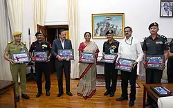 Union Minister for Defence releasing a Border Roads Organisation (BRO) Coffee table book 'Will of Steel', in New Delhi. NSA is also present.