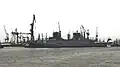 Nordrhein-Westfalen being towed into dock 17 of the Blohm and Voss (B&V) shipyard on 10 November 2015.