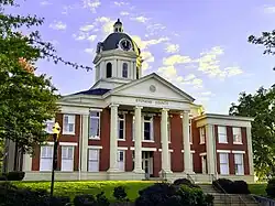 Stephens County Courthouse in Toccoa Under the USA flag is the Stephens County, GA flag