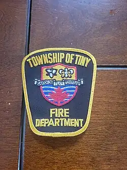 Shoulder Insignia worn by members of the Tiny Township fire department