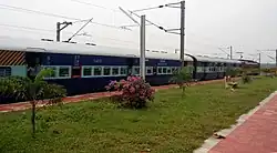 Tirucchirapalli_-_Howrah_Express_exits_Korukonda_train_station