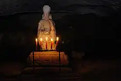 Rare marble Buddhist Avalokitesvara statue, from the Koryo (Goryeo) Dynasty - in situ in a cave near Kwaneumsa (Kwaneum [Guanyin] Temple), Kaesong, North Korea.