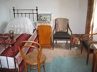 Tolstoy's simple bedroom, as it was when he left the house for the last time in 1910.[citation needed]