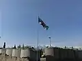 The regimental flag of the Cameron Highlanders of Ottawa flies above a NATO installation near Tora Bora in Afghanistan