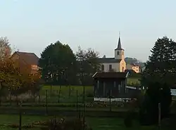 The church and surroundings in Torcheville