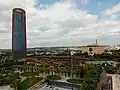 Torre Sevilla (left), Fernando de Magallanes Park (foreground) and the Triana Tower in the background.