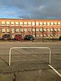 A metal bar and a metal fence constituting obstacles