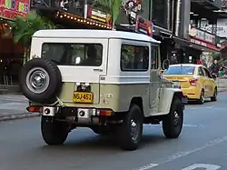 A medium wheelbase J43 with a fibreglass hardtop (Colombia)