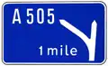 First advance direction sign for an intermediate junction.