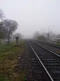 The rail lines of the Railway General Roca, photographed during a clouding morning.