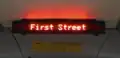Trilingual bus signage in Madison, Wisconsin, U.S., in Hmong, English and Spanish